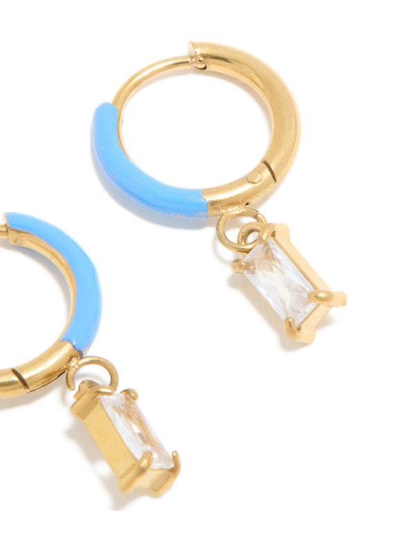 Highlighting waterproof huggie earrings in sky blue enamel with cubic zirconia charm and stainless steel construction post detail view