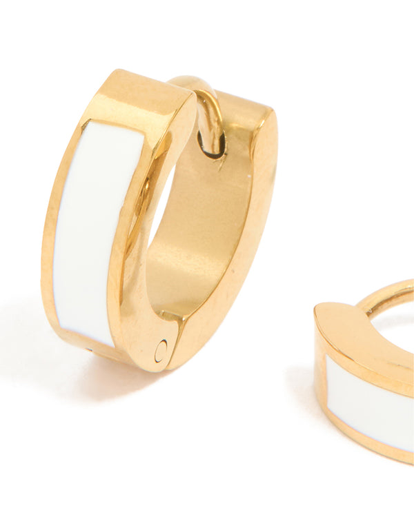 Showcasing waterproof gold plated stainless steel small white enamel inlay huggie earrings close up view
