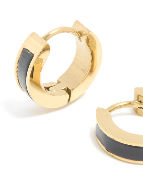 Crafted from waterproof gold plated stainless steel with small black enamel inlay huggie earrings close up view