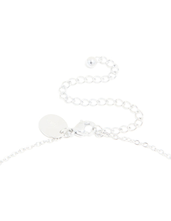 Highlighting a waterproof stainless steel mini bubble letter N necklace with initial pendant in silver clasp detail view