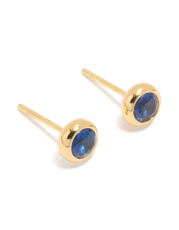 Featuring waterproof gold plated stainless steel sapphire cubic zirconia September birthstone bezel set stud earrings in dainty style front view