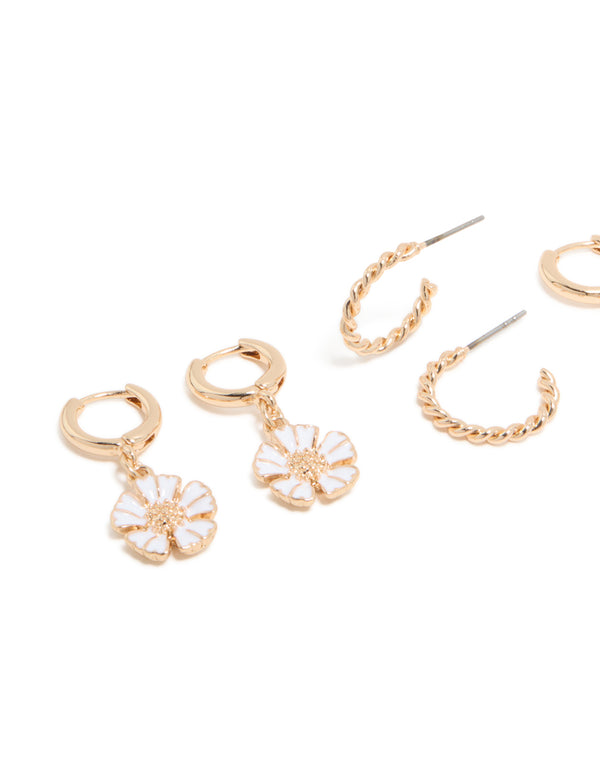 Showcasing Gold Butterfly & Ladybird Earrings 4-Pack with butterfly, floral details in stud and huggie closures close up view