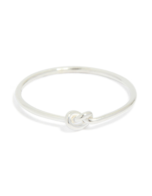 Beautiful sterling silver tiny knot ring with dainty craftsmanship close up view