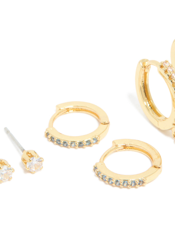Highlighting gold plated brass aquamarine cubic zirconia March birthstone earrings with ball detail 4-pack featuring crystal details close up view