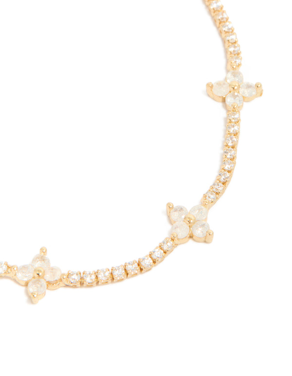 Explore a gold plated cubic zirconia flower toggle bracelet close up view