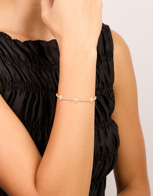 Experience a gold plated cubic zirconia flower toggle bracelet on wrist view