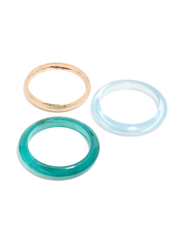 Showcasing a set of textured gold and resin bangles in a 3-pack with green and blue tones front view