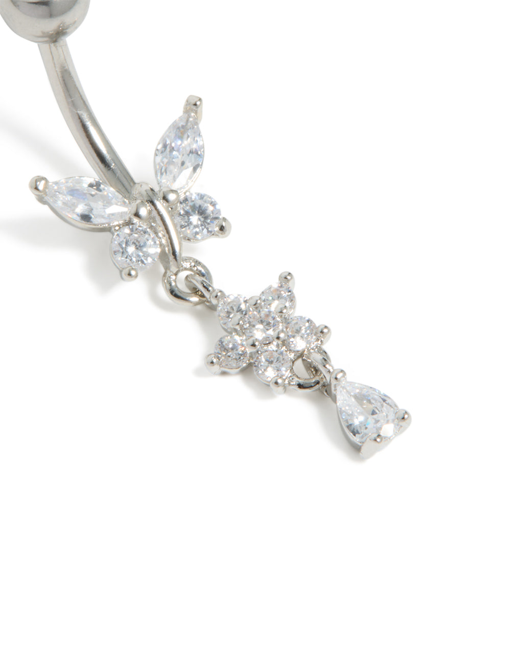 Highlighting surgical steel cubic zirconia butterfly and flower belly bar with balls, floral charm, and bar in silver close up view