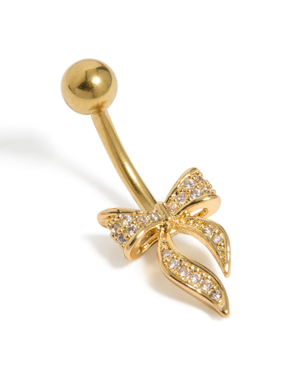 Crafted from surgical steel, this gold plated belly bar features a long pavé bow with cubic zirconia and ball ends detail front view