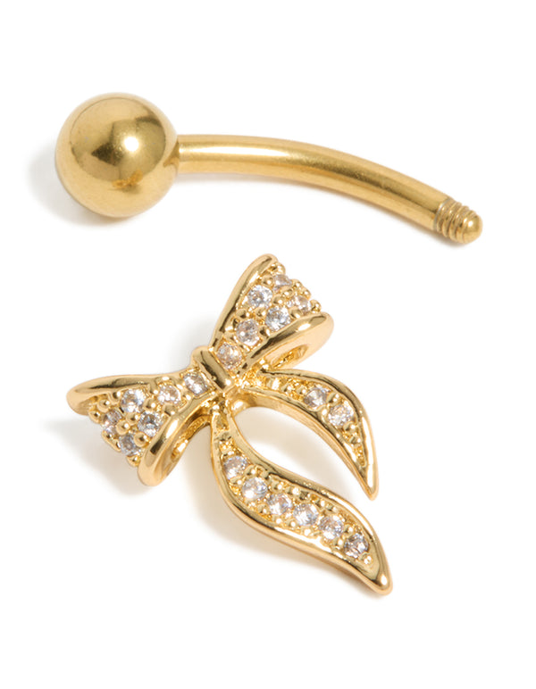 Designed with a long pavé bow charm, this gold plated surgical steel belly bar features cubic zirconia and ball ends detail view