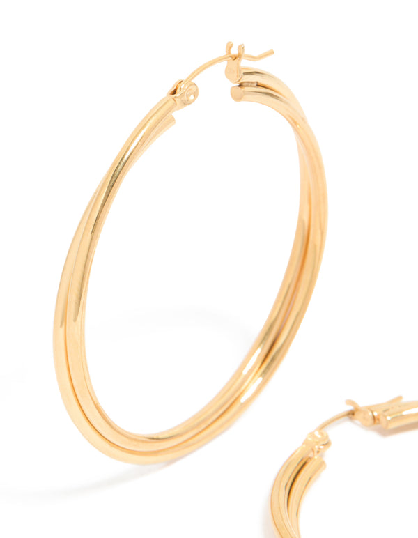 Featuring gold plated surgical steel crossover hoop earrings with 40 MM diameter close up view