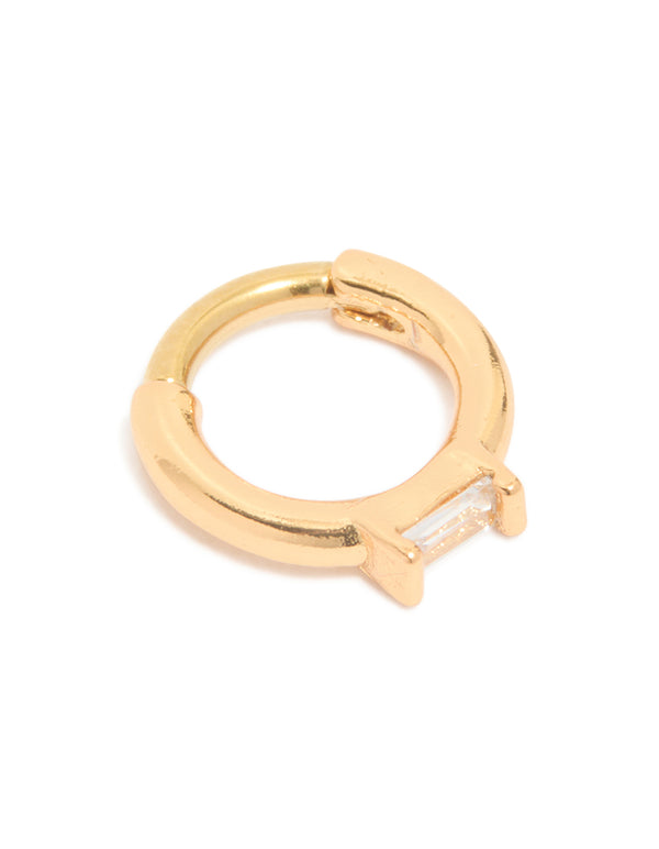 Showcasing a gold plated surgical steel rectangle cubic zirconia baguette clicker ring in clear stone side view