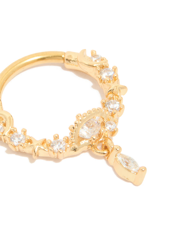 Celestial hoop clicker ring with cubic zirconia, star details, and gold plated surgical steel construction close up view