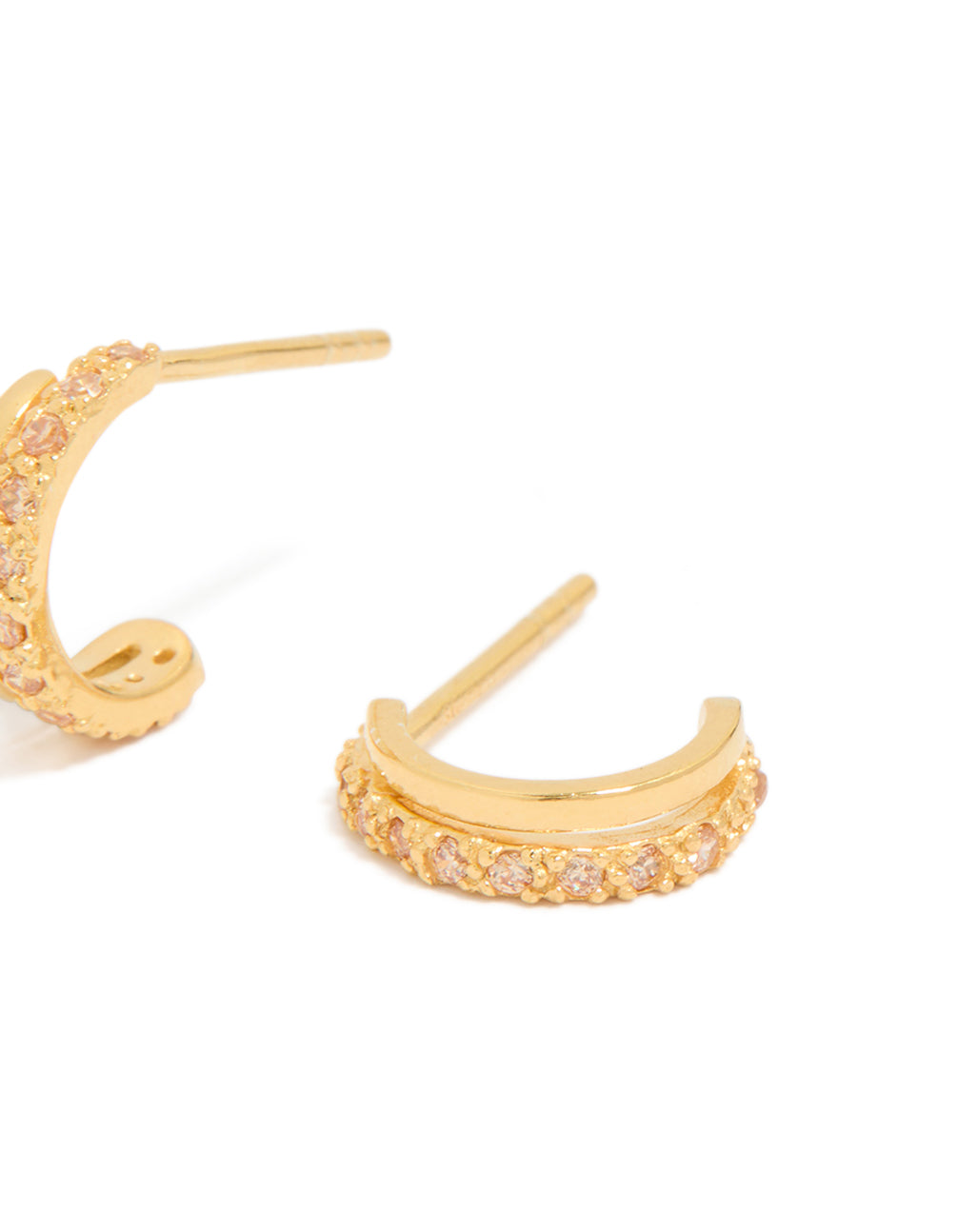 Displaying gold plated sterling silver cubic zirconia double hoop huggie earrings with pink accents post detail view