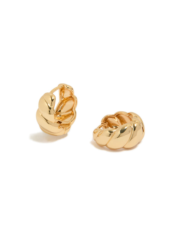Showcasing gold plated brass croissant hoop earrings with hoop closure front view
