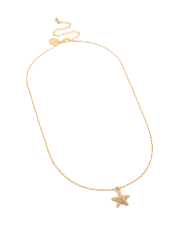 Beautifully crafted gold plated brass pavé cubic zirconia starfish pendant necklace featuring ocean theme front view