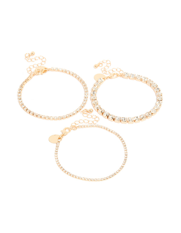 Elegant diamante tennis bracelets in a 3-packin gold front view