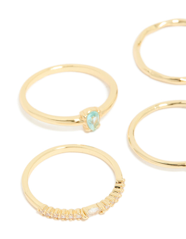 Featuring gold plated aqua cubic zirconia rings 5-pack with stackable crystal charm details close up view