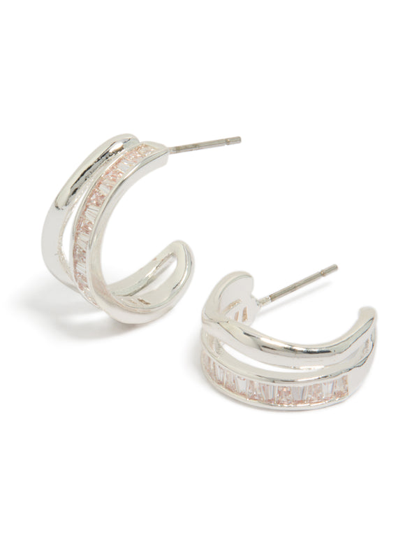 Showcasing silver plated cubic zirconia illusion baguette hoop earrings with statement style front view