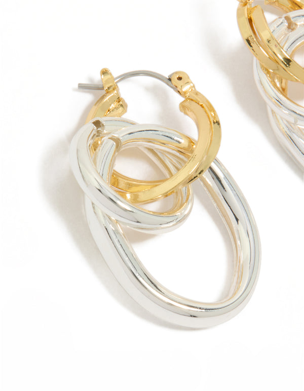 Highlighting mixed metal plated double link illusion hoop earrings showcasing gold and silver statement design close up view