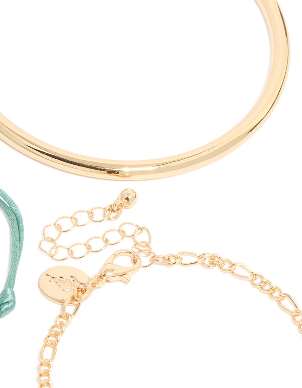Highlighting a gold turquoise stone bangle and cord bracelets 4-pack with coin closure detail view