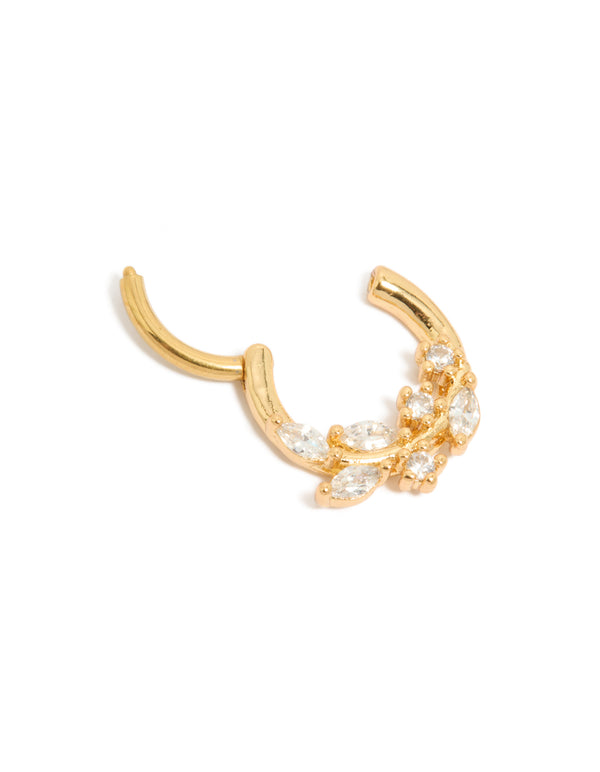 Featuring a vine-inspired floral pattern with marquise and round cut cubic zirconia, this gold plated titanium clicker ring is captured in detail view