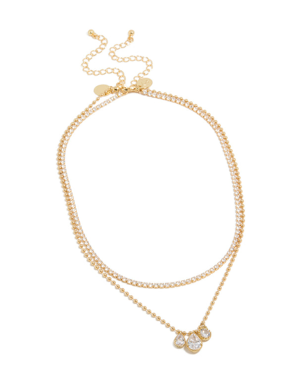 Stunning gold plated cubic zirconia tennis and droplets layered necklace featuring balls front view