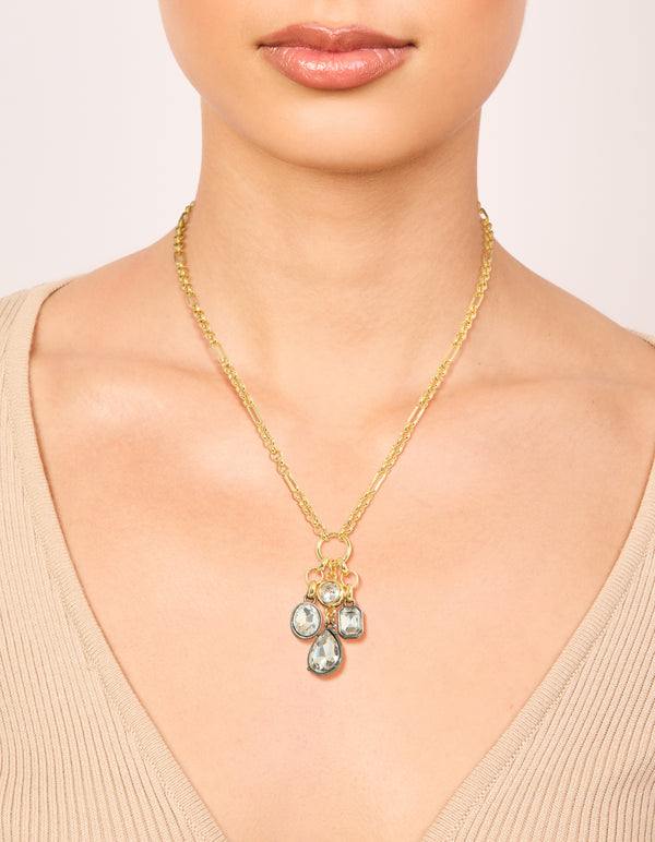 Featuring a mixed metal plated diamante cluster drop necklace with cubic zirconia in gold statement style on neck view