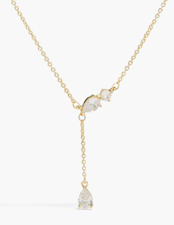 Showcasing a gold plated cubic zirconia trio Y-necklace close up view
