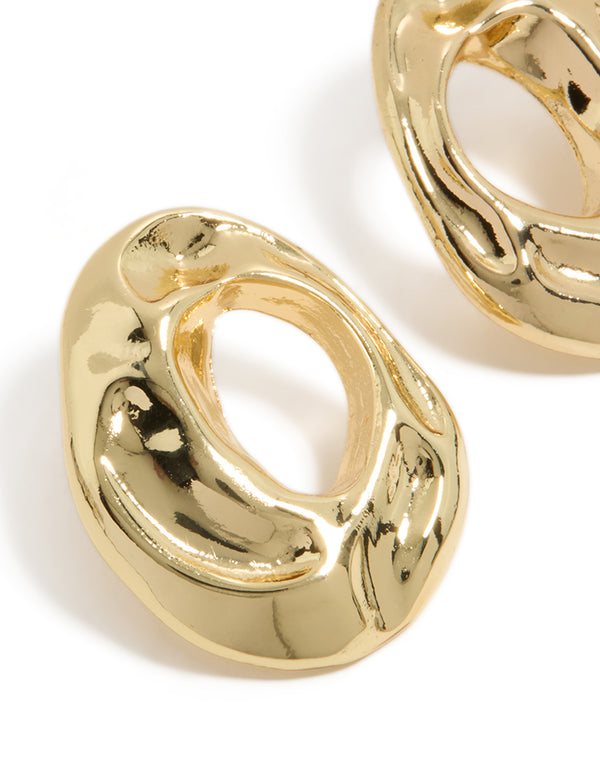 Featuring open organic circle stud earrings crafted from gold plated material close up view