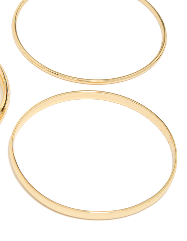 Discover this multi size bangle in a 3-pack crafted from gold plated material featuring a smooth polished surface close up view