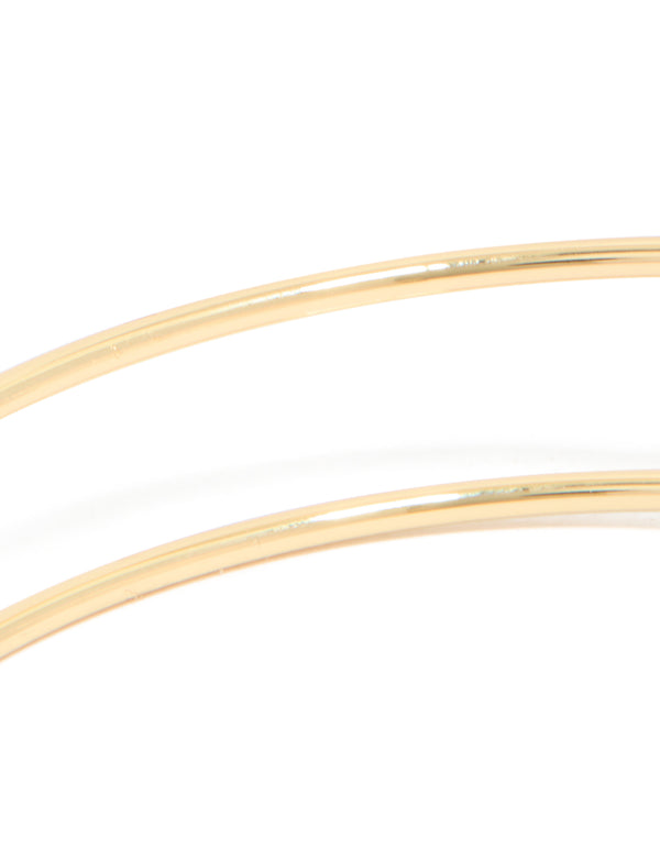 Crafted from gold plated material, this diamante wrap around arm cuff features statement styling detail view