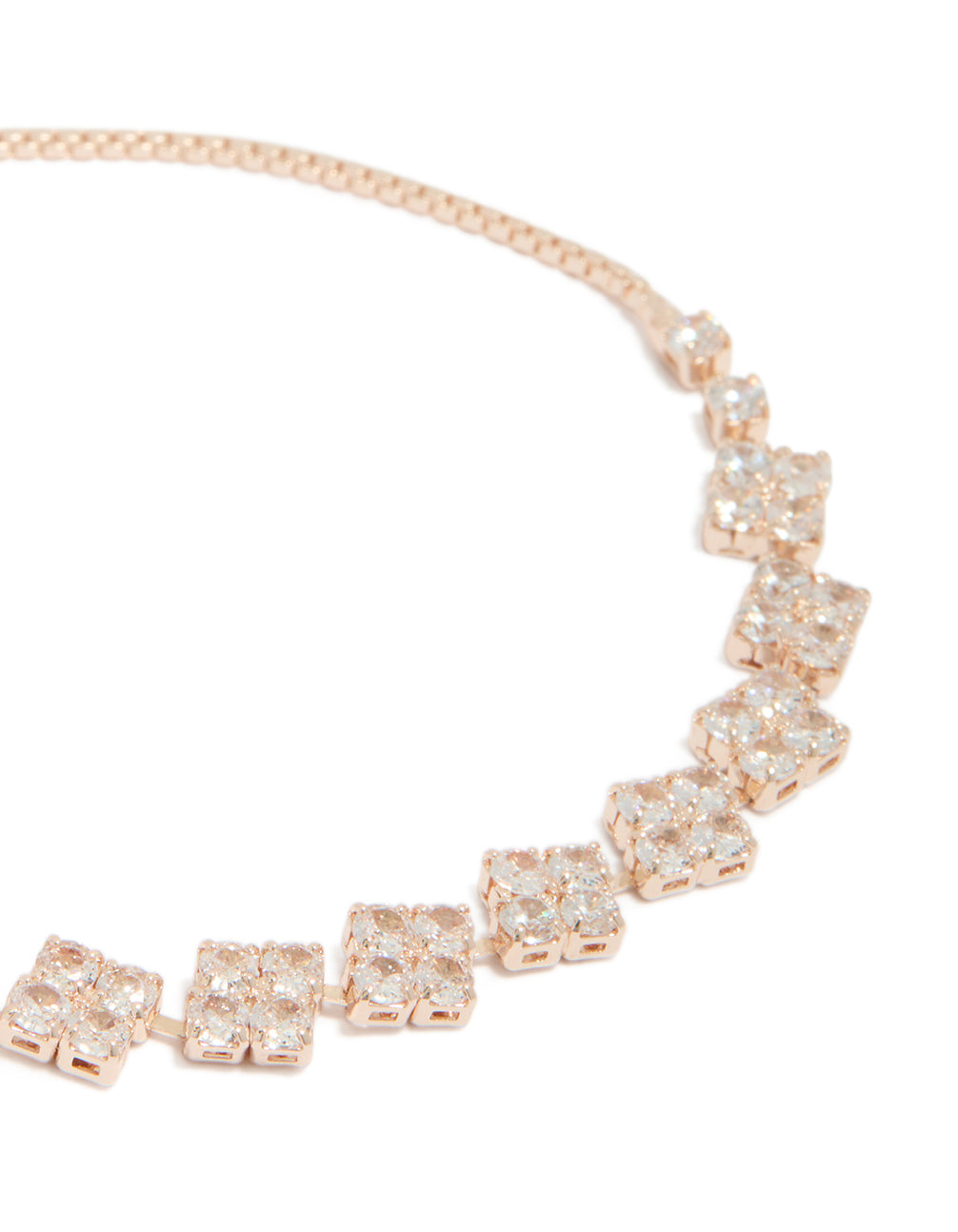 Highlighting rose gold plated cubic zirconia flower detail toggle bracelet close up