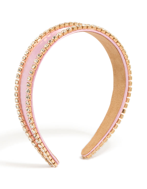 Discover a statement pink diamante outline headband crafted from glass front view