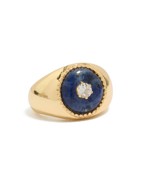 Showcasing a gold plated chunky cubic zirconia blue stone ring with clear accents style front view
