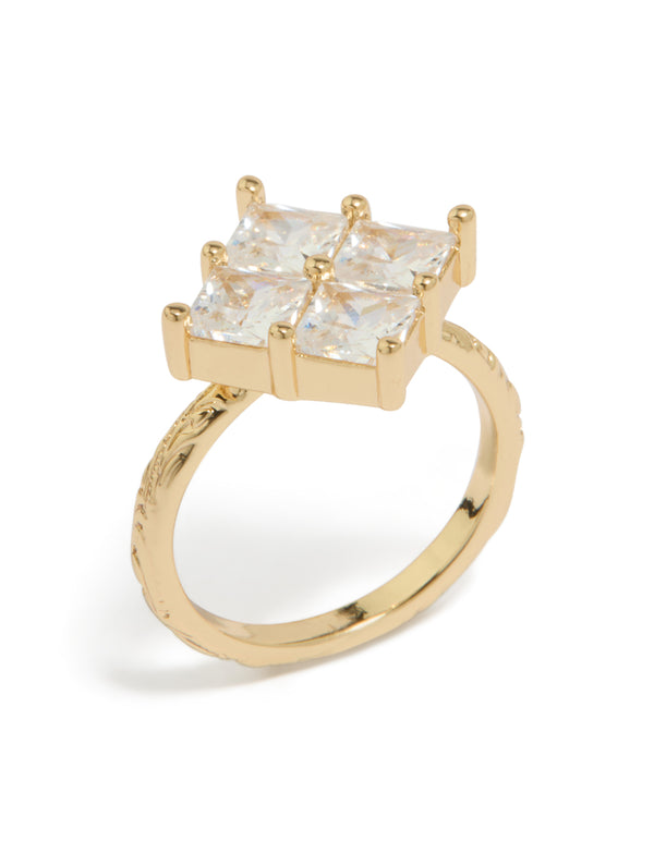 Featuring a gold plated cubic zirconia textured square ring with statement design in clear stone front view