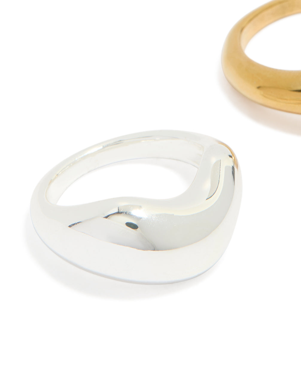 Designed with waterproof gold and silver plated stainless steel organic bubble rings in a 2-pack close up view
