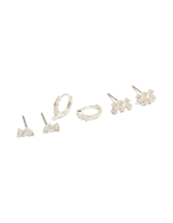 Discover dainty mini trio stud and huggie earrings crafted from silver plated cubic zirconia in a 3-pack front view