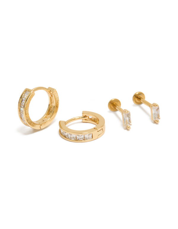 Showcasing dainty flat back studs and hoops pack in gold plated titanium with baguette cut cubic zirconia crystal front view