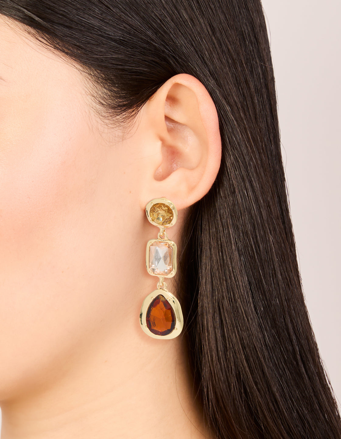 Crafted with statement gold brown diamantes drop earrings on ear view