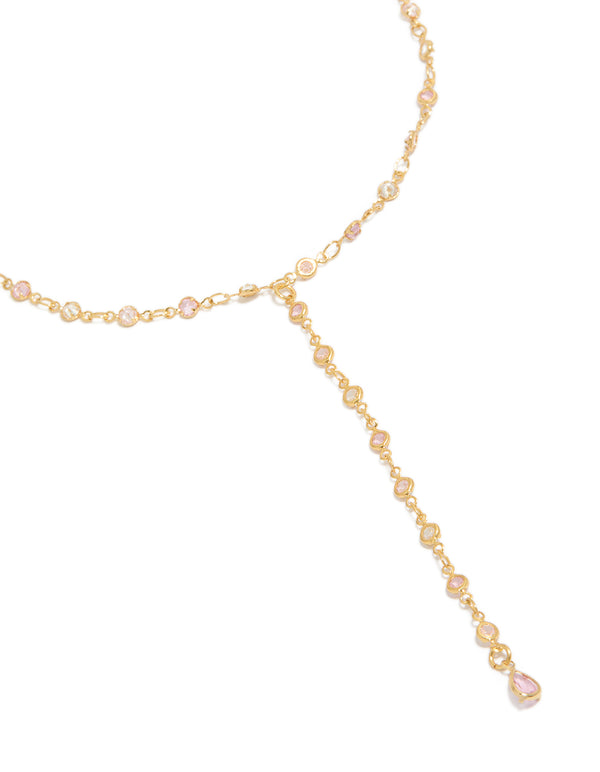 Showcasing a pink and clear cubic zirconia circles Y-necklace crafted from gold plated material with statement dainty styling close up view