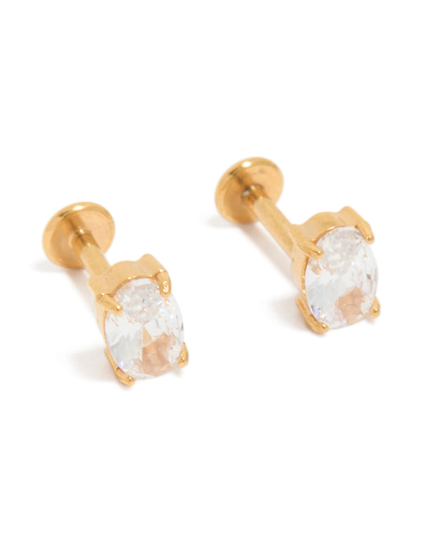 Showcasing gold plated surgical steel cubic zirconia oval flat back studs in gold and clear front view