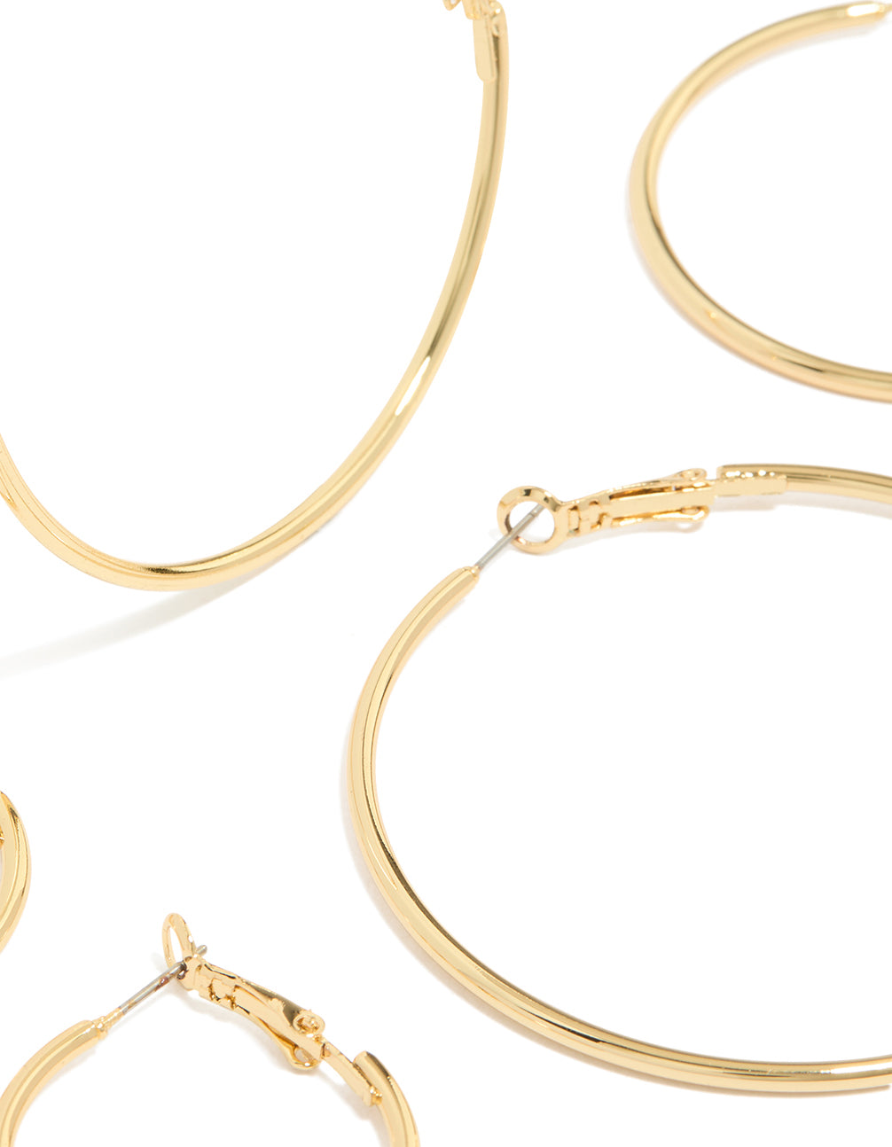 Featuring gold plated small and medium hoop earrings 3-pack with closure detail close up view