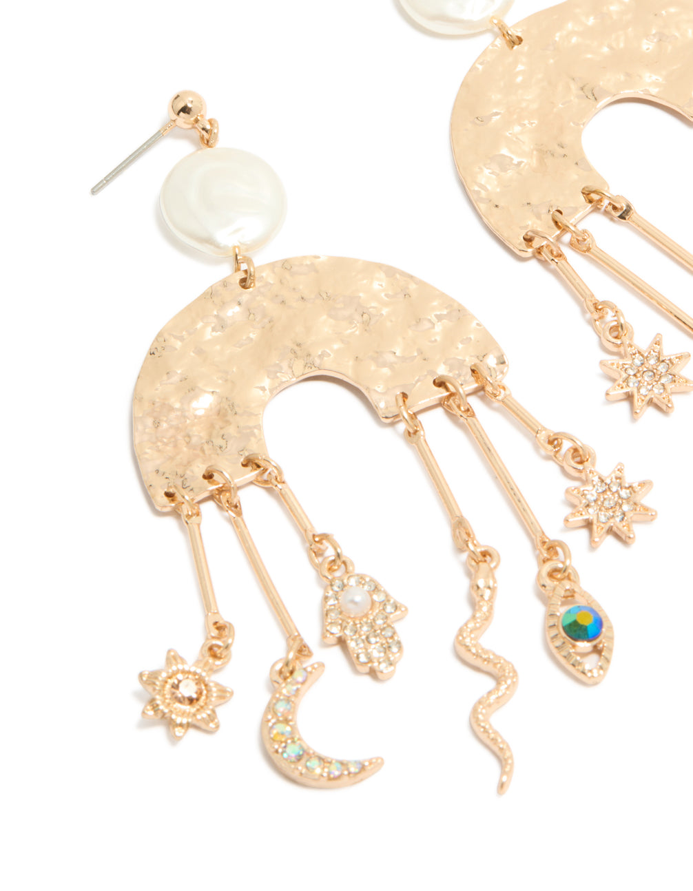 Featuring brushed gold rainbow and celestial charm drop earrings in a statement style, featuring moon, pearl, star, sun, hamsa hand, and snake charms close up view