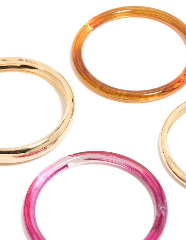 Featuring gold brown and dark pink acrylic 4-pack bangles close up view
