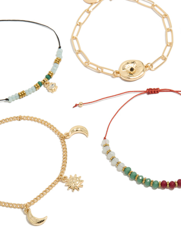 Detailed look at gold celestial beaded bracelets with star sun moon cord in teal coral black close up view