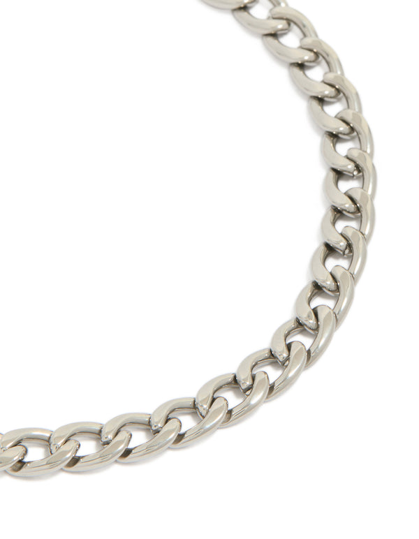 Presenting a mens waterproof stainless steel classic curb chain bracelet in silver close up view