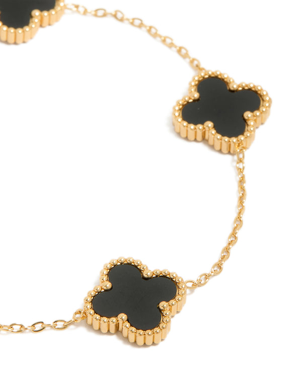 Designed with waterproof gold plated stainless steel black clover chain bracelet featuring charm accents in a dainty style close up view