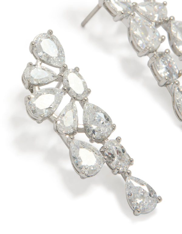Elegant floral drop earrings crafted with pear cut cubic zirconia and silver finish close up view