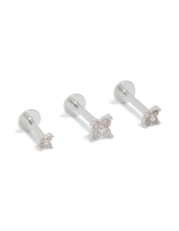 Crafted from sterling silver, these flower flat back stud earrings in a 3-pack with clear accents front view